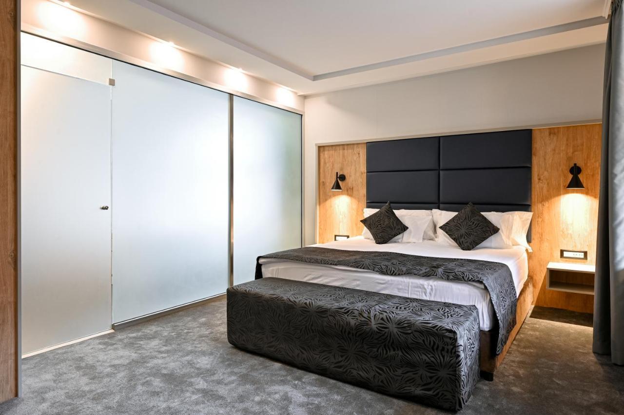 그랜드 호텔 벨린그라드 벨린그래드 외부 사진 A bedroom at the hotel